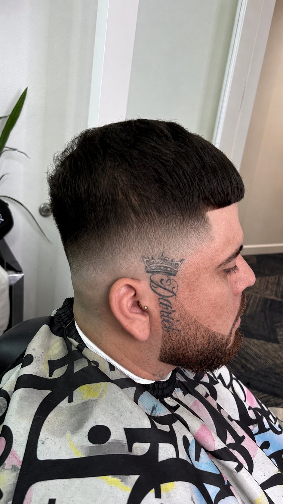 Short textured crop with a tight fade, Die4Fadez Barbershop client in National City, CA